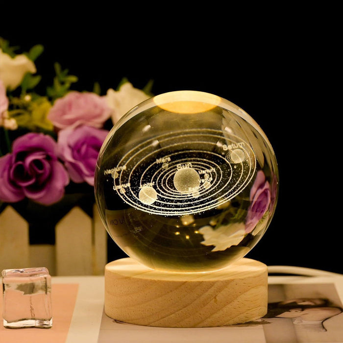 Crystal Ball Universe Lamp with 3D solar system engraving.