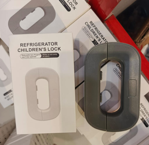 Children's refrigerator lock with packaging on a table