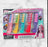 Packaged hair color comb set with colorful combs and 'Fashion Girl!' branding on a marble background.